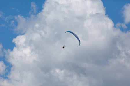 Lonely Paraglider against the background of clouds in Russia near Nizhny Novgorod