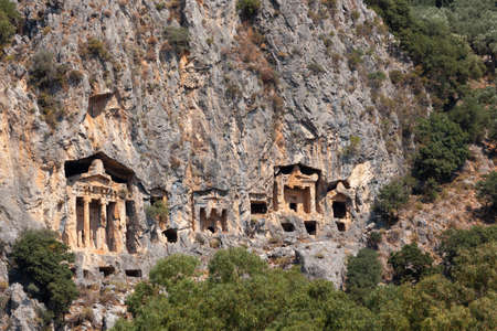 Lycian Royal mountain tombs carved into the rocks near the town of Dalyan in the province of Marmaris in Turkeyの写真素材