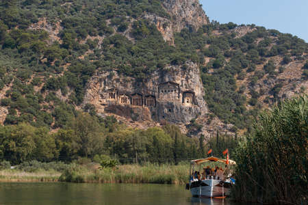 Lycian Royal mountain tombs carved into the rocks near the town of Dalyan in the province of Marmaris in Turkeyの写真素材