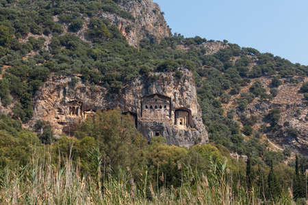 Lycian Royal mountain tombs carved into the rocks near the town of Dalyan in the province of Marmaris in Turkeyの写真素材