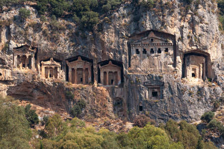 Lycian Royal mountain tombs carved into the rocks near the town of Dalyan in the province of Marmaris in Turkeyの写真素材