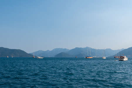 Yachts, boats and sailboats floating in the Bayの写真素材