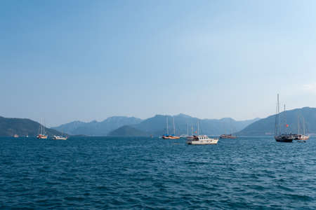 Yachts, boats and sailboats floating in the Bayの写真素材