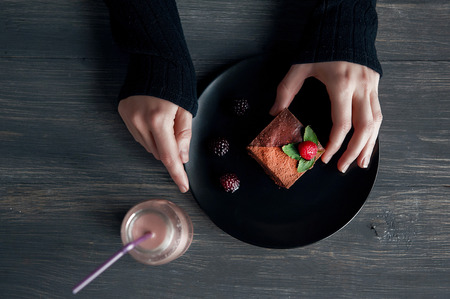 homemade chocolate brownies on dark background.の写真素材