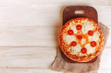 Hot Homemade Pepperoni Pizza Ready to Eat. natural lightの写真素材