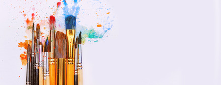artistic brushes on wooden backgroundの写真素材