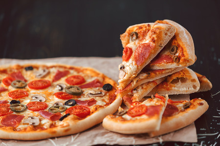 Hot Homemade Pepperoni Pizza Ready to Eat. natural lightの写真素材