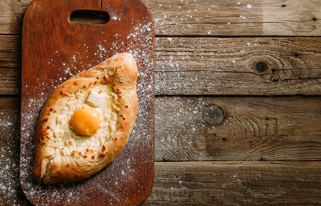 Khachapuri in Adzharian with Adyghe cheese, cheese and yolk. Traditional Caucasian foodの写真素材