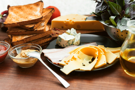 meat, toast and vegetables for a sandwichの写真素材
