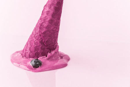 fallen pink ice cream on a light background. abstract imageの写真素材