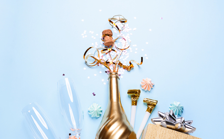 concept of opening an expensive golden champagne bottle dedicated to the celebration.の写真素材