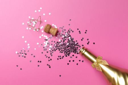 concept of opening an expensive golden champagne bottle dedicated to the celebration.の写真素材