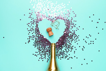 concept of opening an expensive golden champagne bottle dedicated to the celebration.の写真素材