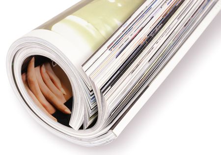 Roll up magazines isolated on white backgroundの写真素材