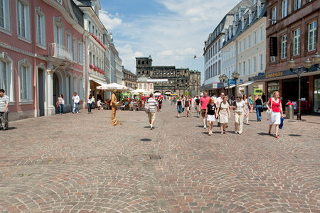 street and view on Porta Nigra in Trier, Germany on June 28, 2010