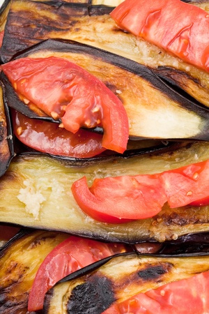 fried eggplants with fresh tomatoの写真素材