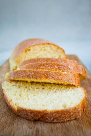 sicilian semolina yellow bread on wooden board