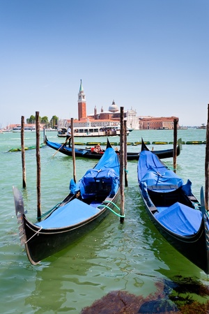 VENICE, ITALY - JUNE,23: gondolas and view on San Giorgio Maggiore through San Marco Canal in Venice, Italy on June 23, 2011のeditorial素材