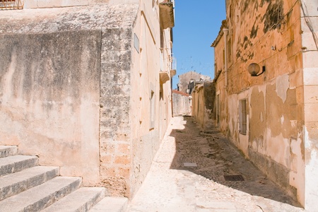 narrow street in baroque style town - Noto, Sicilyの写真素材