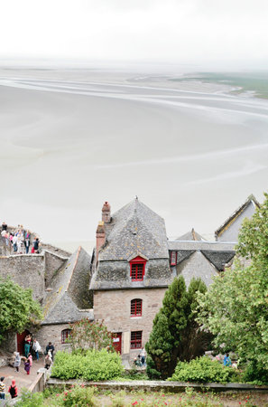 MONT SAINT-MICHEL, FRANCE - JULY 5: tidal sea bottom around Mont Saint-Michel. More than 3000000 people visit Saint Michaelのeditorial素材