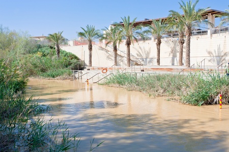 view on Jordan river and Israel bank in baptism siteの写真素材