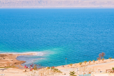 panorama with people on sand beach of Dead Sea, Jordan on February 20, 2012のeditorial素材