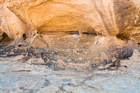Petroglyphs on sandstone rock in Wadi Rum dessert, Jordan