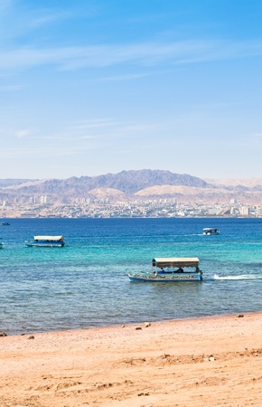 Aqaba gulf and view on Israel town Eilat from Jordanの写真素材