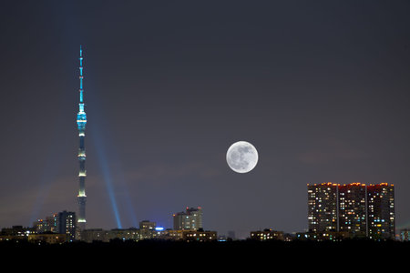 full moon under city, Ostankino television tower, Moscow