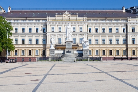 view on Monument to Princess Olga, St. Andrew and the Apostle Cyril and Methodius and building of ukrainian diplomatic Academy in Kiev, Ukrainaのeditorial素材
