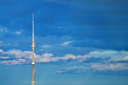 television tower with deep blue cloudy afternoon sky backgroundのeditorial素材