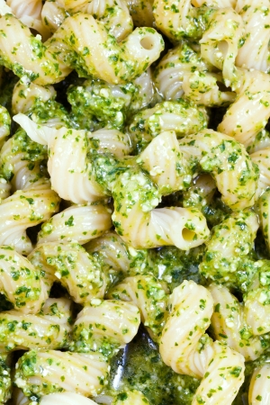 italian pasta cavatappi with pesto sauce close upの写真素材