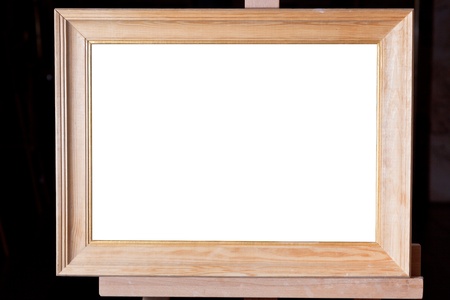 wide wooden picture frame with white cut out canvasの写真素材