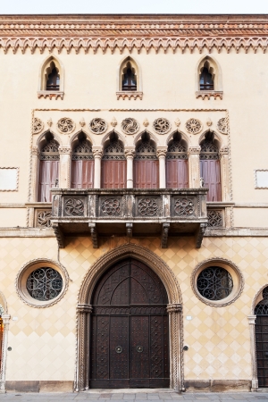 door, balcony of medieval house in Bologna, Italyのeditorial素材