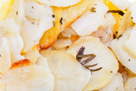 food background from sliced baked potatoes close upの写真素材