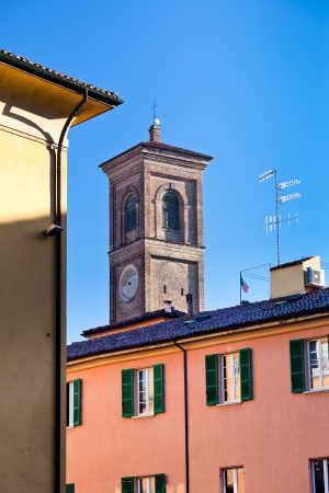 old italian tower and houses , Bologna, Italy in sunny autumn morningの写真素材