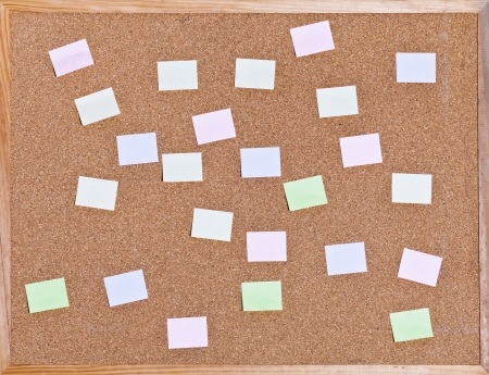 many memo sticks on on cork board in wooden frameの写真素材