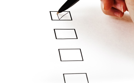 put tick in black square box by simple black ballpointの写真素材