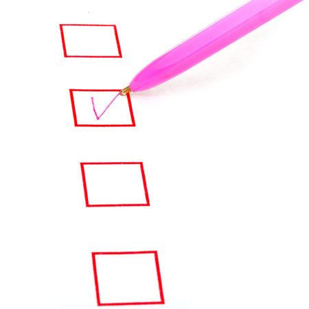 tick in red square box by pink ball pen