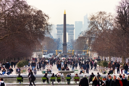 PARIS, FRANCE - MARCH 5: Luxor Obelisk and triumphal arch from Tuileries Garden. Jardin des Tuileries was first opened to the public in 1667, in Paris, France on March 5, 2013のeditorial素材