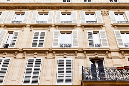facacade of urban house with balcony in Paris, Franceのeditorial素材
