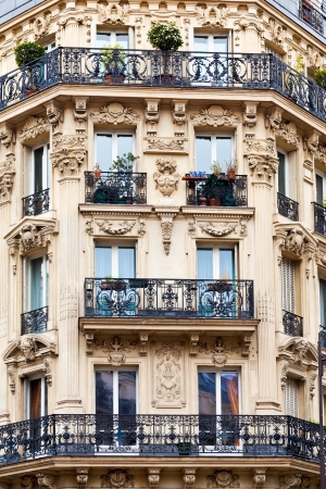 corner of of typical house with balcony in Paris, Franceのeditorial素材