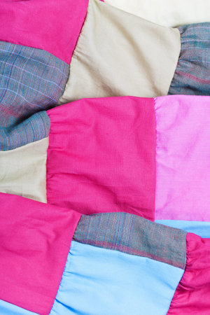 hand made pink patchwork quilt texture