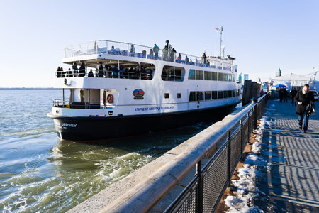 NEW YORK, USA - FEBRUARY 5: Cruise Ship in New York on February 5, 2010. 75-minute cruise sails from Midtown out to Liberty Island for a close-up look at Statue of Liberty and Ellis Islandのeditorial素材