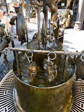 AACHEN, GERMANY - JUNE 27: Fountain of Puppets in Aaachen, Germany on June 27, 2010. It was created in 1975 by the Aachen sculptor Boniface Stirnberg.のeditorial素材