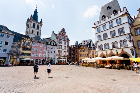 TRIER, GERMANY- JUNE 28: old Market square in Trier, Germany, on June 28, 2010. This cental square came into existence around 10th century and marked by a replica of stone cross that dates 958 yearのeditorial素材