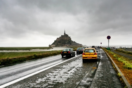MONT SAINT-MICHEL, FRANCE - JULY 5: road to Mont Saint-Michel France on July 5,2010. It was used in 6-7th centuries as Armorican stronghold and first monastic building was established in 8th centuryのeditorial素材
