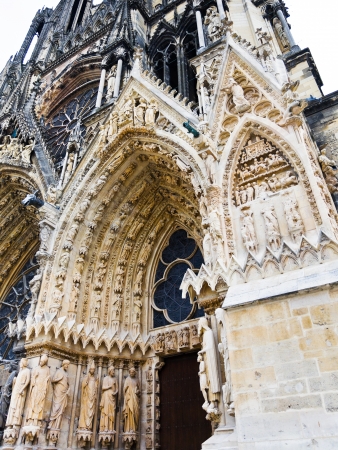 Entrance in gothic catholic Notre-Dame Cathedral in Reims, Franceの写真素材