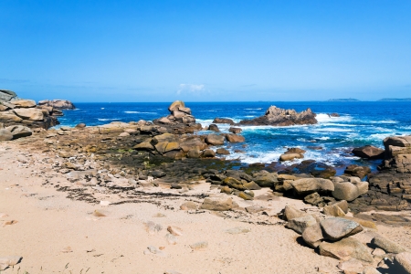 Breton stone beach in sunny dayの写真素材