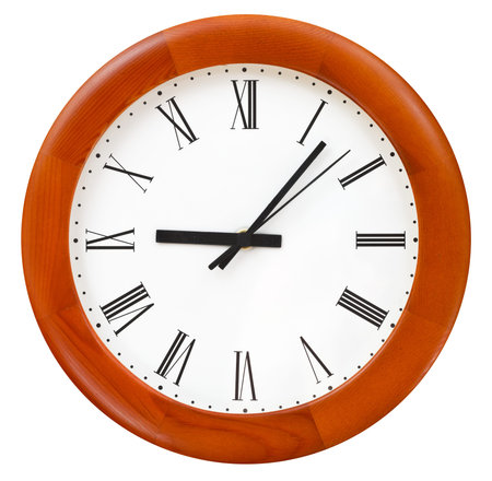 six minutes past nine on round dial wall clock